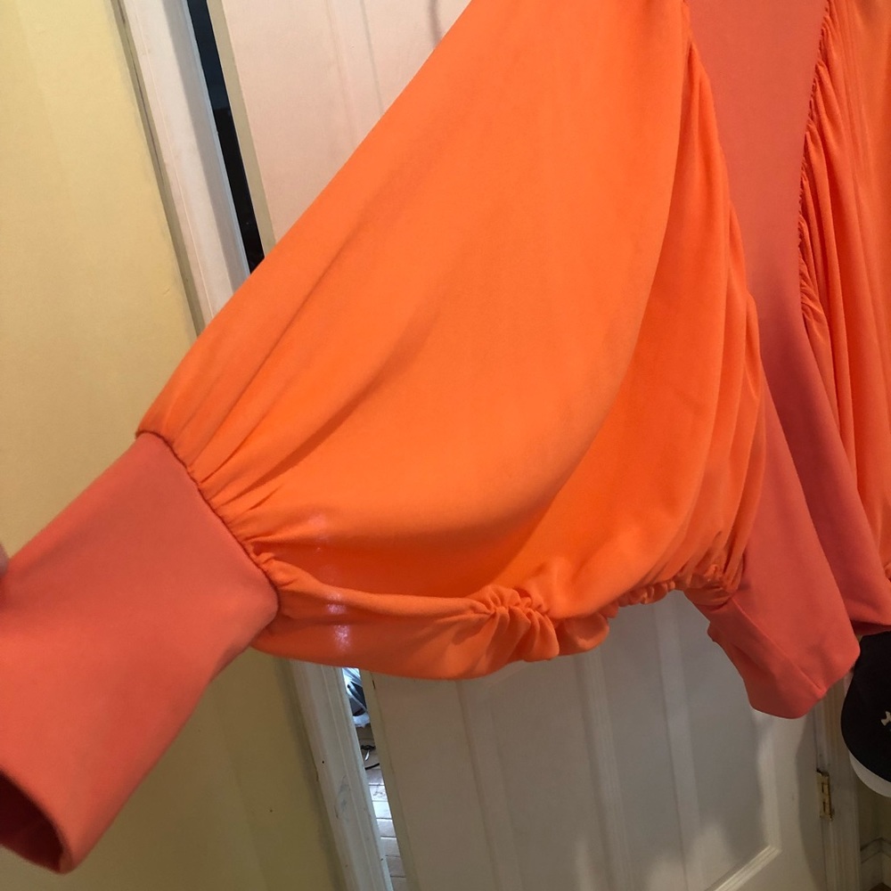 Beautiful Bat Wing blouse. Can be worn with jeans or dress pants.